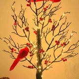 Heller Vintage-Baum mit Kardinälen